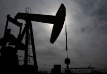 Oil drops on lower demand forecasts despite deadlock in US-Iran talks