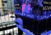 Shares ease in Asia as oil climbs, yields stay high