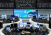 Shares set for weekly gain, FX, bonds await Warsh’s Jackson Hole debut