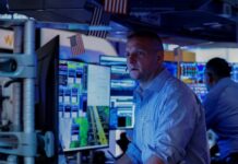 Shares steady, dollar slips as markets pare Fed rate risks