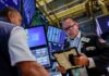 Stocks fall while dollar, bond yields rise as Warsh prompts rate hike bets