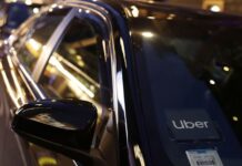 Uber forecasts weak quarterly profit, doubles down on robotaxi investment plans