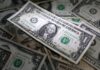 US data buoys dollar as Fed hike expectations nudged higher