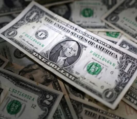 US data buoys dollar as Fed hike expectations nudged higher