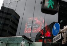 Asian shares waver as oil and yields rise ahead of Fed, BOJ meetings