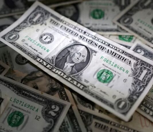 Dollar eases from seven-week peak as oil prices extend decline