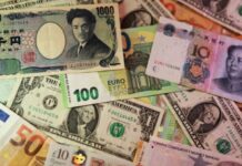 Dollar gains, euro slips after expected ECB rate increase