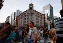 Japan services growth hits five-month high, PMI shows