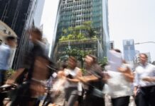 Larger firms must have certified HR staff by 2028; tripartite report urges ‘people-centred AI transformation’