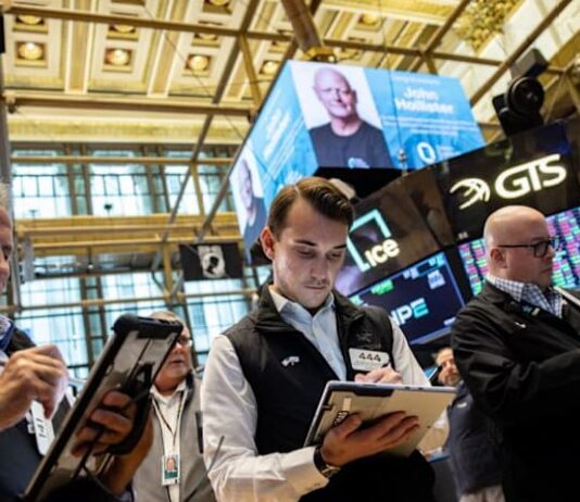 Nasdaq sets record high, oil dips on improved crude flows