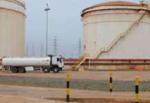 Oil prices fall as markets look to Iran truce, but remain wary of attacks on oil facilities