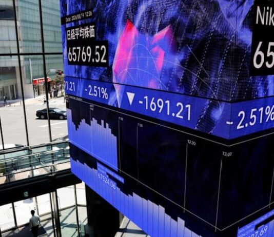 Shares tick higher as Fed hikes rates, dollar jumps with short-term yields