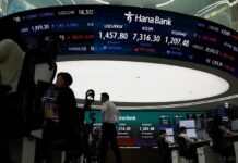 Stocks rise as oil falls, bonds steady ahead of Fed decision