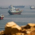 Stocks sink, yields at multi-decade highs and oil spikes on Mideast flare-up