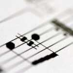 Suno releases new AI music models in partnership with Warner Music, BMG