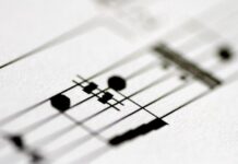 Suno releases new AI music models in partnership with Warner Music, BMG