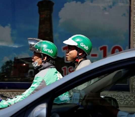 Vietnam’s Grab drivers call for two-day app boycott over falling earnings