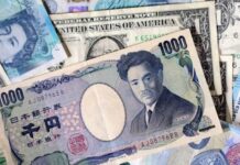 Yen headed for strongest week in a month, dollar flat ahead of payroll data
