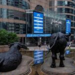 Asian stocks skid, Wall Street and bonds aided by oil slip