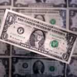 Dollar eases from 18-month high as Treasury yields fall; Fed hike bets ease
