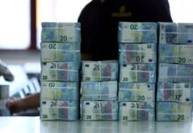 Dollar heads for fourth straight weekly gain versus euro