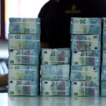 Dollar set for fourth weekly gain versus euro