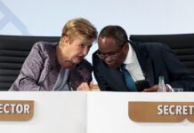 IMF chief urges cooperation on AI and war risks, as US hails economic momentum
