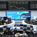 Oil eases, bringing some respite to stocks and battered bonds