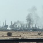 Oil prices rise as storms and air strikes threaten supply