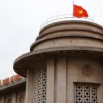 Vietnam’s central bank says inflation is higher than targeted but remains under control