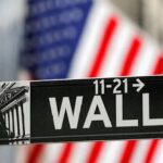 Wall Street firms tie bonuses, promotions to AI skills, survey finds